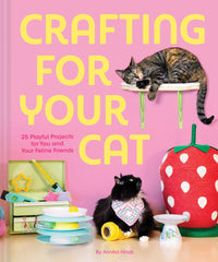 Book cover of 'Crafting for Your Cat' with cats and craft items on a pink background
