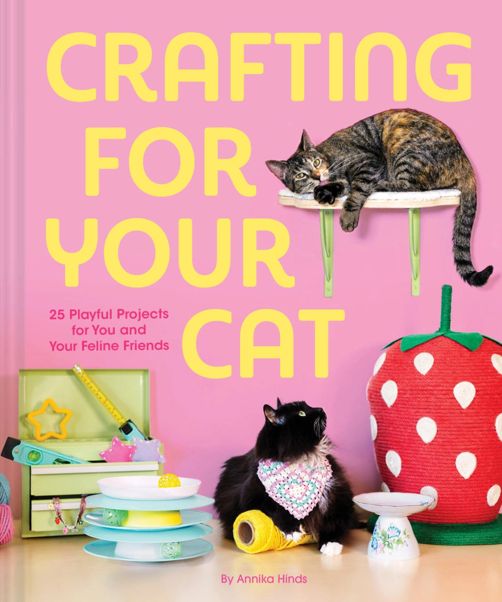 Book cover of 'Crafting for Your Cat' with cats and craft items on a pink background