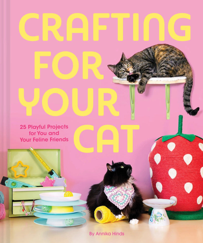 Book cover of 'Crafting for Your Cat' with cats and craft items on a pink background