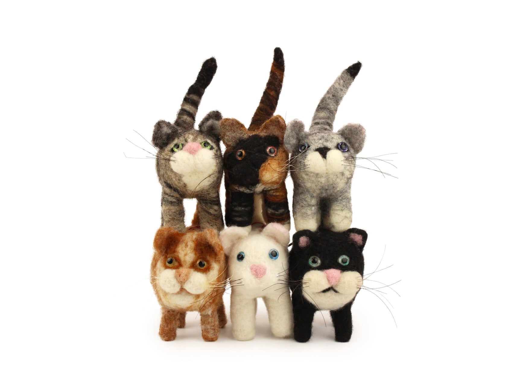 Set of six felted cat toys in various colors on a white background