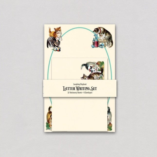 Letter writing set with cat illustrations on a gray background