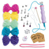Contents of the kit, including various colors of yarn, charms, tags, chenille, beads, knitting tool, knitting pick and bead threader