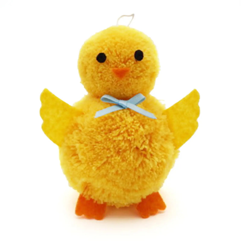 Yellow chick with a blue bow pom pom ornament on a white background.