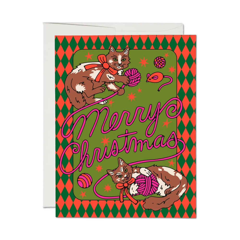 Colorful card with kittens playing with yarn balls and "Merry Christmas" written across.