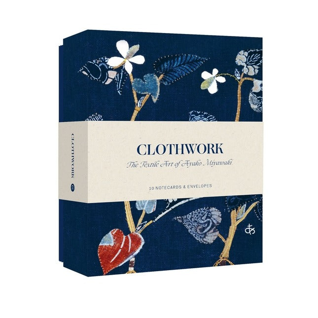 Box of 'Clothwork' notecards with floral designs on a blue background