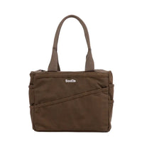 Brown tote bag with 'Soolia' branding on a white background