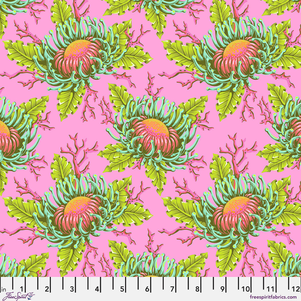 Fabric pattern with green and pink floral design on a pink background