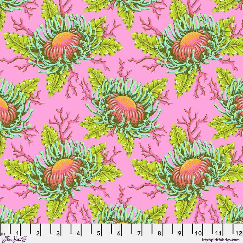 Fabric pattern with green and pink floral design on a pink background