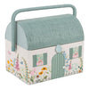 Sewing box with a floral and cottage design on a white background