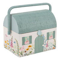 Sewing box with a floral and cottage design on a white background