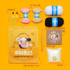 Woobles crochet kit with yarn, needle, eyes, hook, and instructions on a yellow background