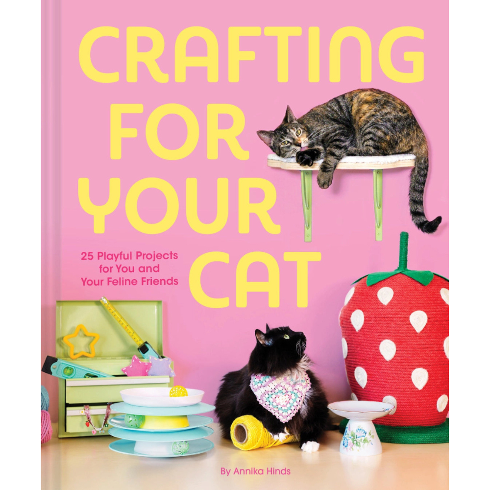 Book cover of 'Crafting for Your Cat' with cats and craft items on a pink background