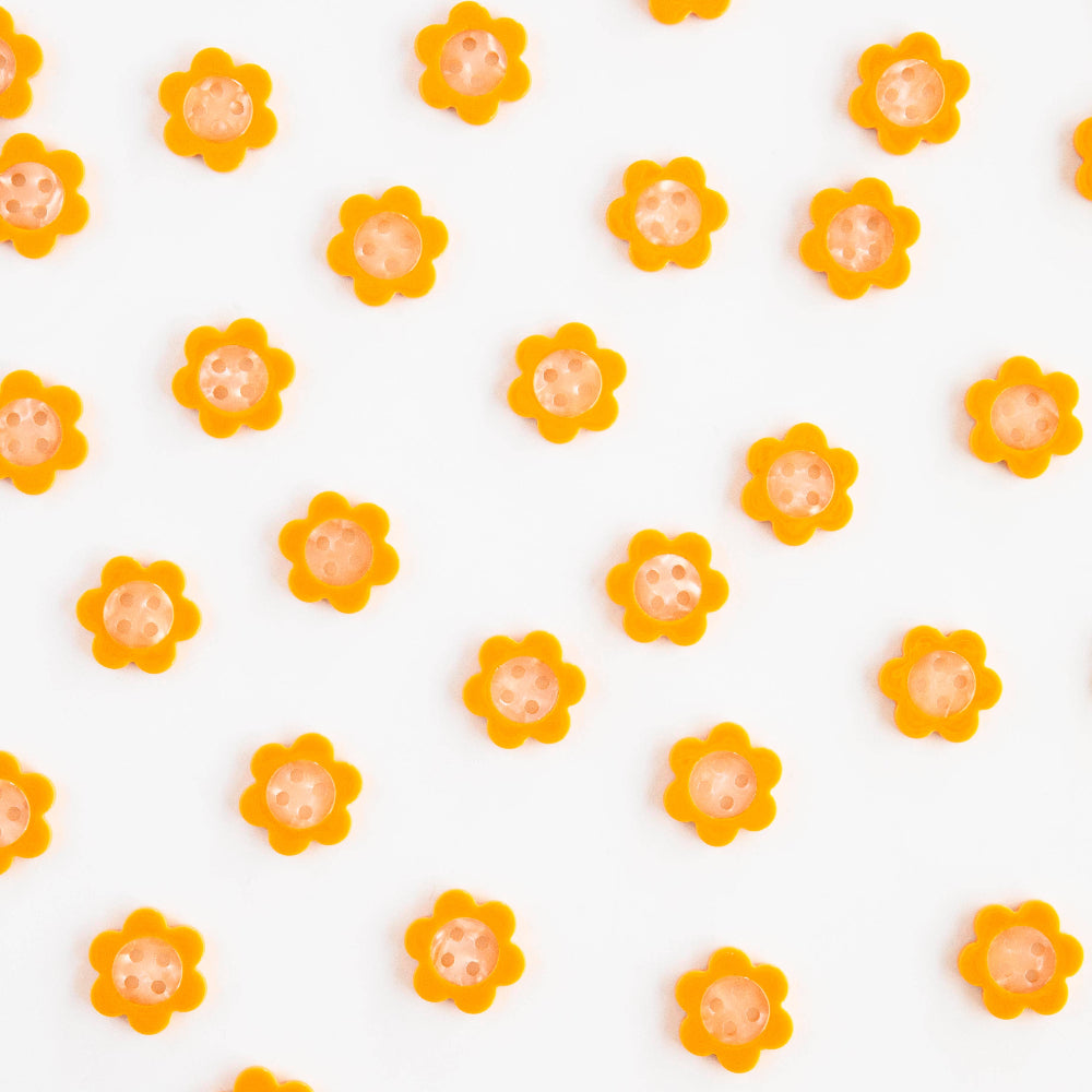 Pattern of orange flowers on a white background