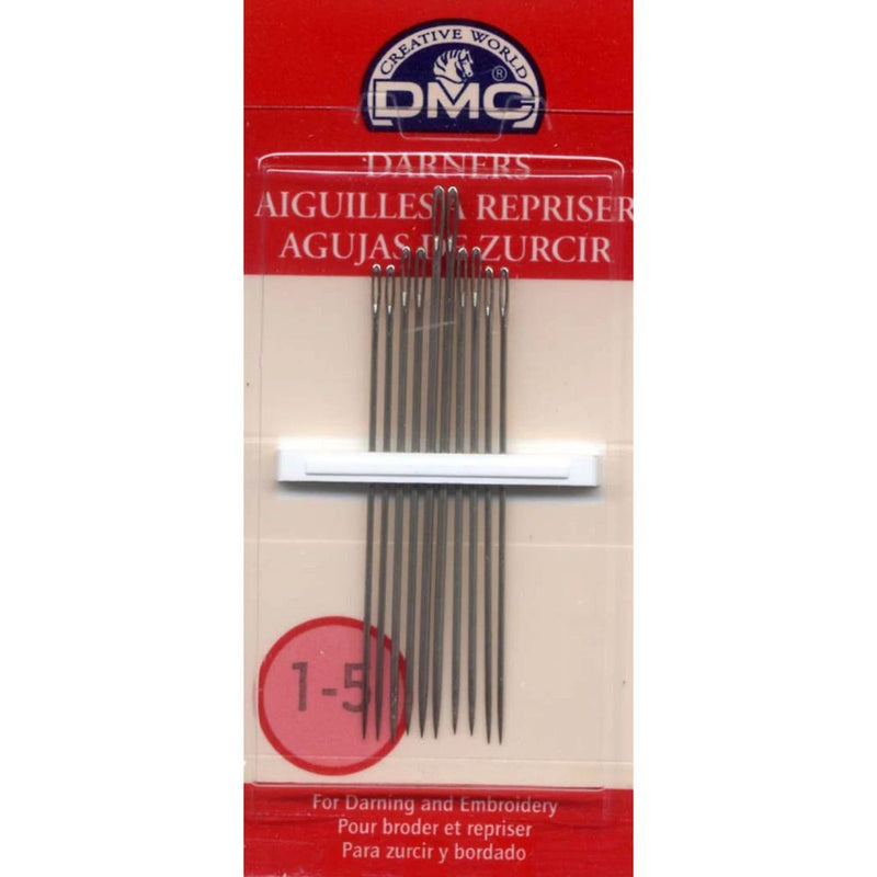 Pack of DMC needles for darning on a beige and red background