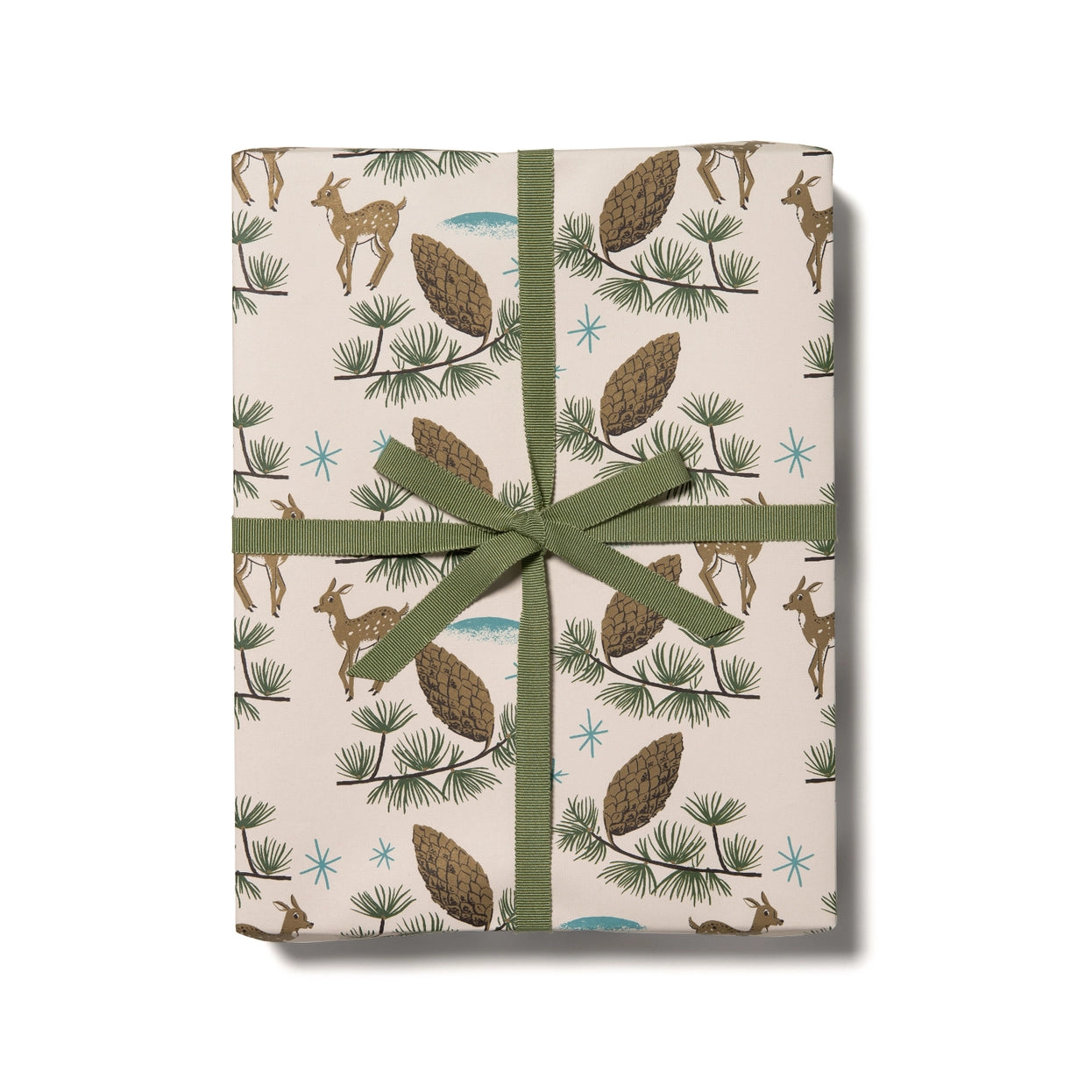 Gift box with images of deer and pine cones and green ribbon on a white background.