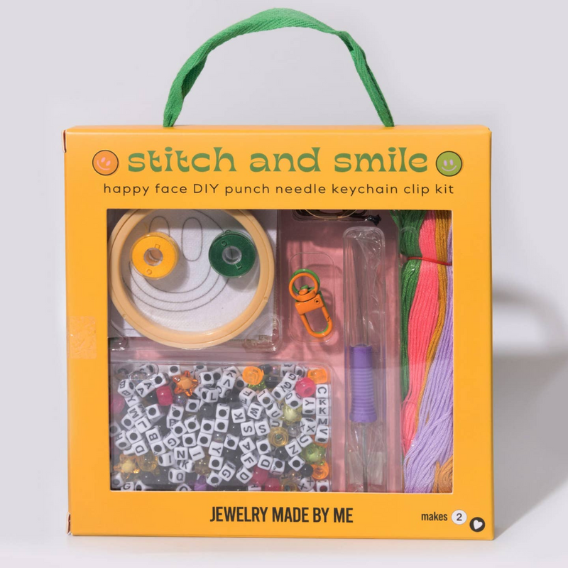 orange packaging with green lettering sating "stitch and smile." 
