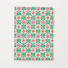 Floral patterned notebook on a white background