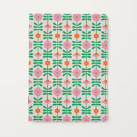Floral patterned notebook on a white background