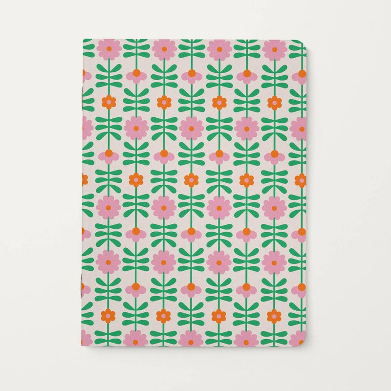 Floral patterned notebook on a white background