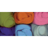 Colorful yarn balls in various hues on a white background