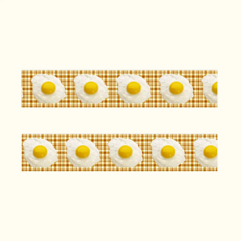 Strips of washi tape with fried eggs on a checkered background