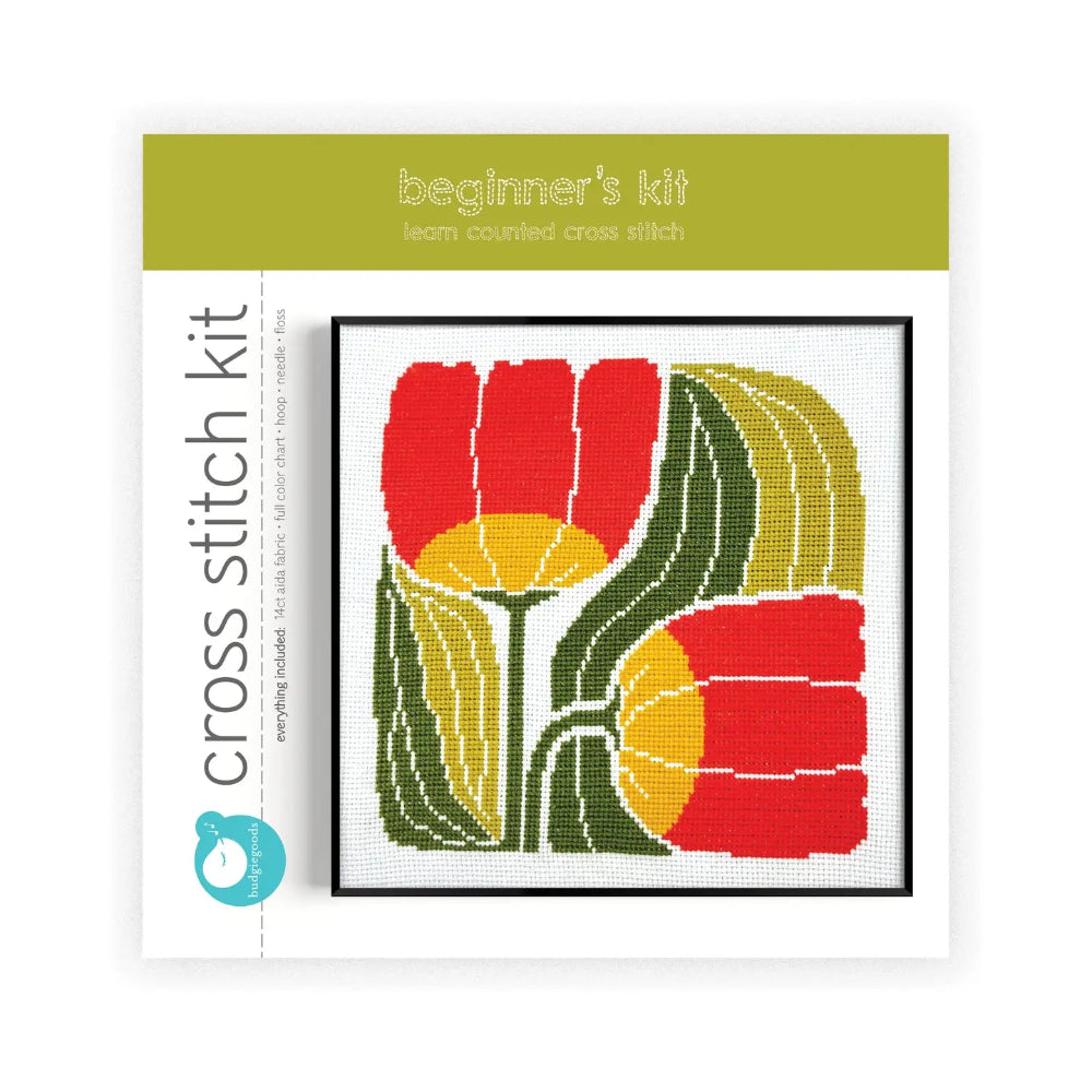 Cross stitch kit for beginners with a floral design on a white background