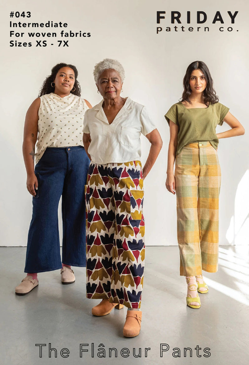 3 women wearing different colored pants on the packaging of the Flaneur Pants Pattern