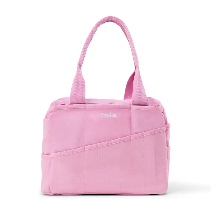 Pink handbag with a visible brand logo on a white background