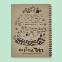 Notebook with a frog illustration and text on a light green background