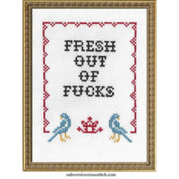 Cross-stitched design with text and birds in a decorative frame.