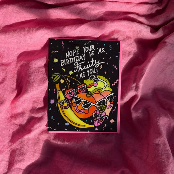 Black card with fruit wearing sunglasses. 'Hope your birthday is as fruity as you' 