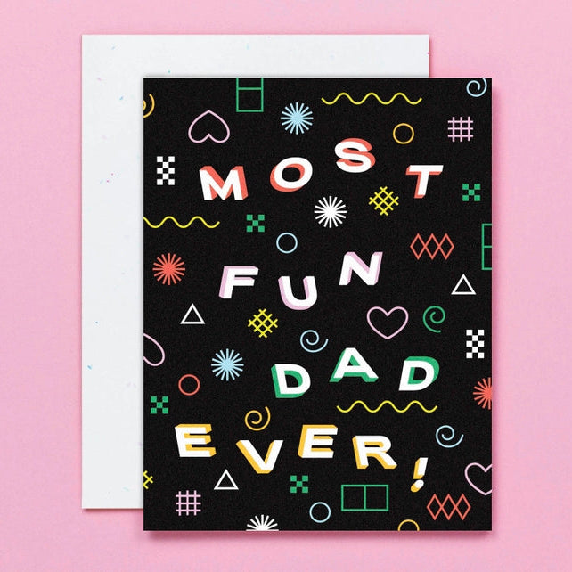 Black card with multi colored lettering 'Most fun dad ever!'