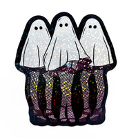 Three ghost-shaped stickers with colorful patterns on a white background