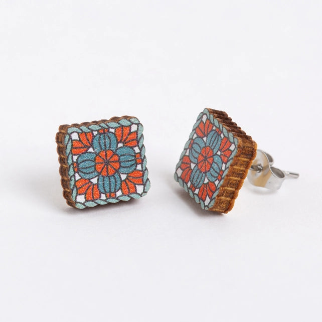 Square floral patterned granny square earrings on a white background