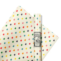 Pack of paper with colorful gumdrop pattern on a white background