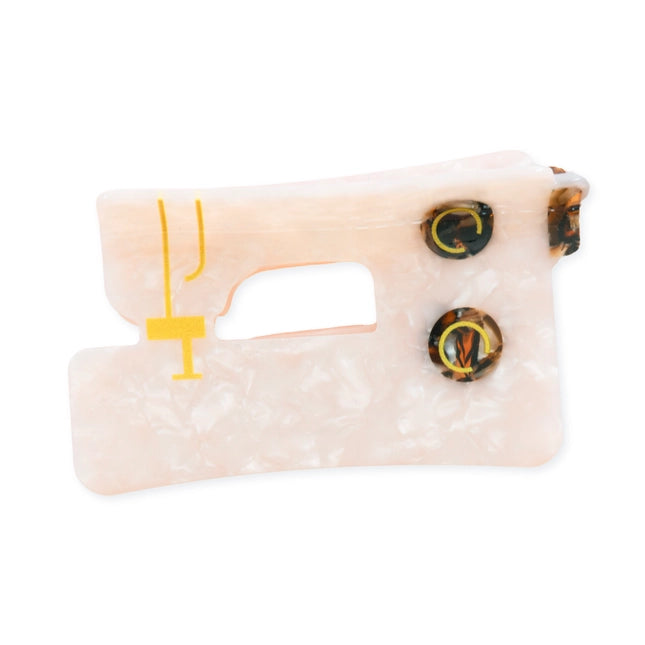 Sewing machine hair claw