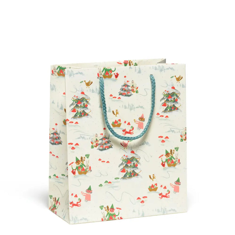White bag with blue handles with images of Christmas trees with mushrooms and forest animals on a white background.