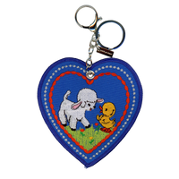 Blue embroidered heart with lamb and duckling design, attached to a silver key ring.