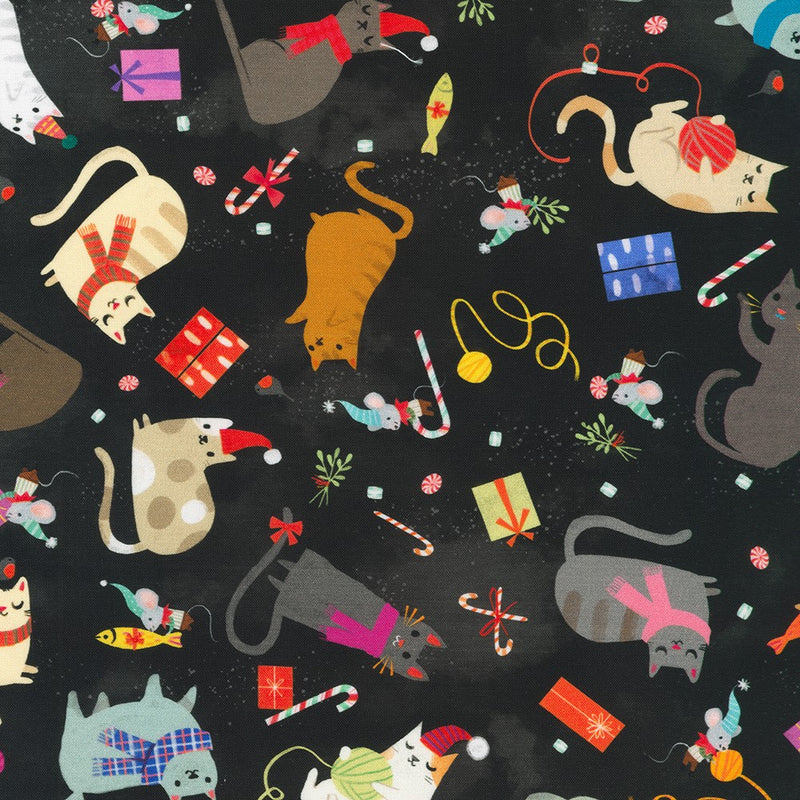 Close-up of black fabric with images of cats mice, and other christmas items on it.