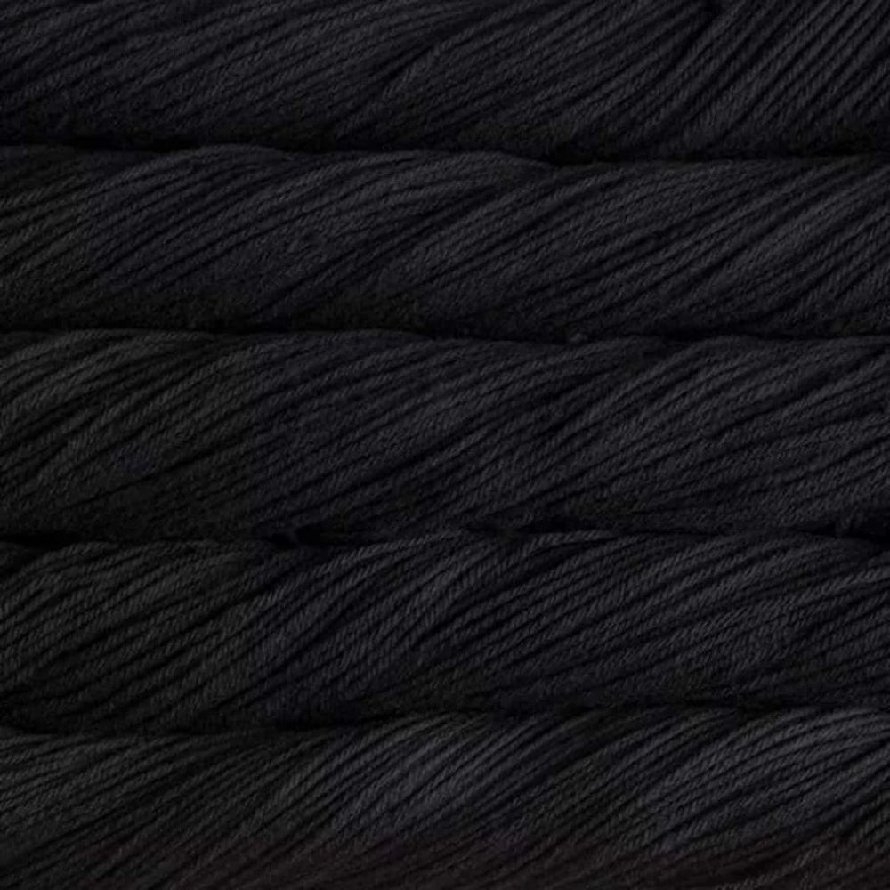 Close-up of black yarn with a textured surface