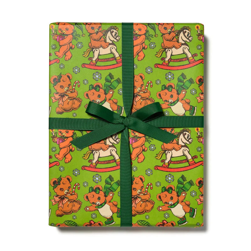Green wrapping paper with playful bears 