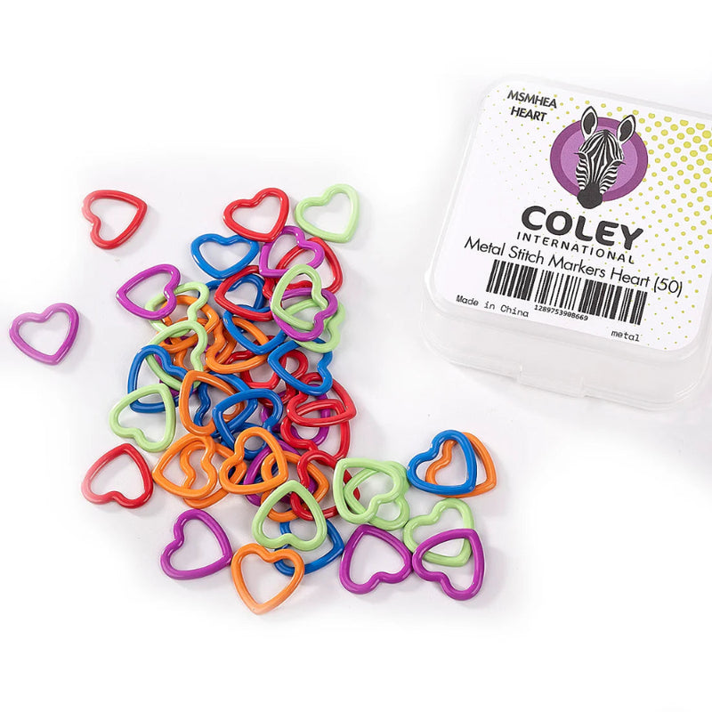 Heart shaped metal stitch markers in assorted bright colors, next to small plastic carrying case