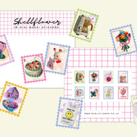 Collection of Shellflower mini washi stickers on a pink grid background
