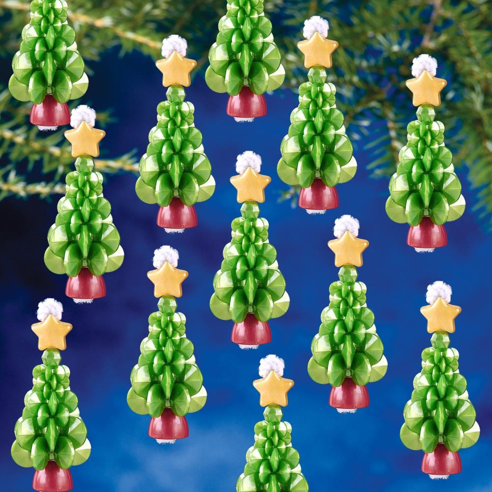 Decorative Christmas tree ornaments with green trees, red bases, and yellow stars on a blue background.