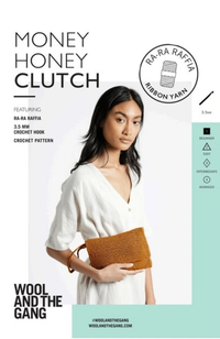 A cover image of the 'Money Honey Clutch Bag Crochet Pattern' booklet by Wool and the Gang, featuring a woman holding a clutch bag made from raffia yarn.