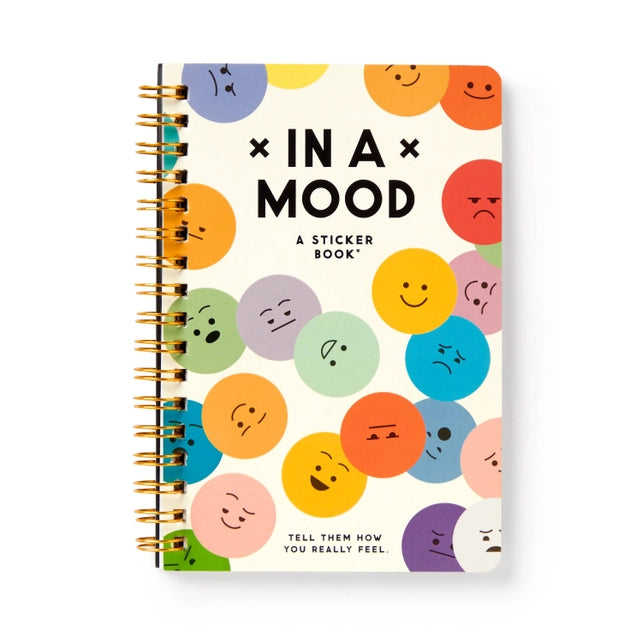 Sticker book with colorful emoji-style circles on a white background