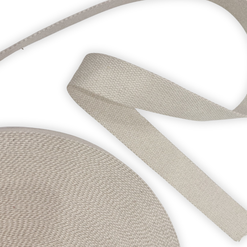 Close-up of beige woven webbing
 on a white background