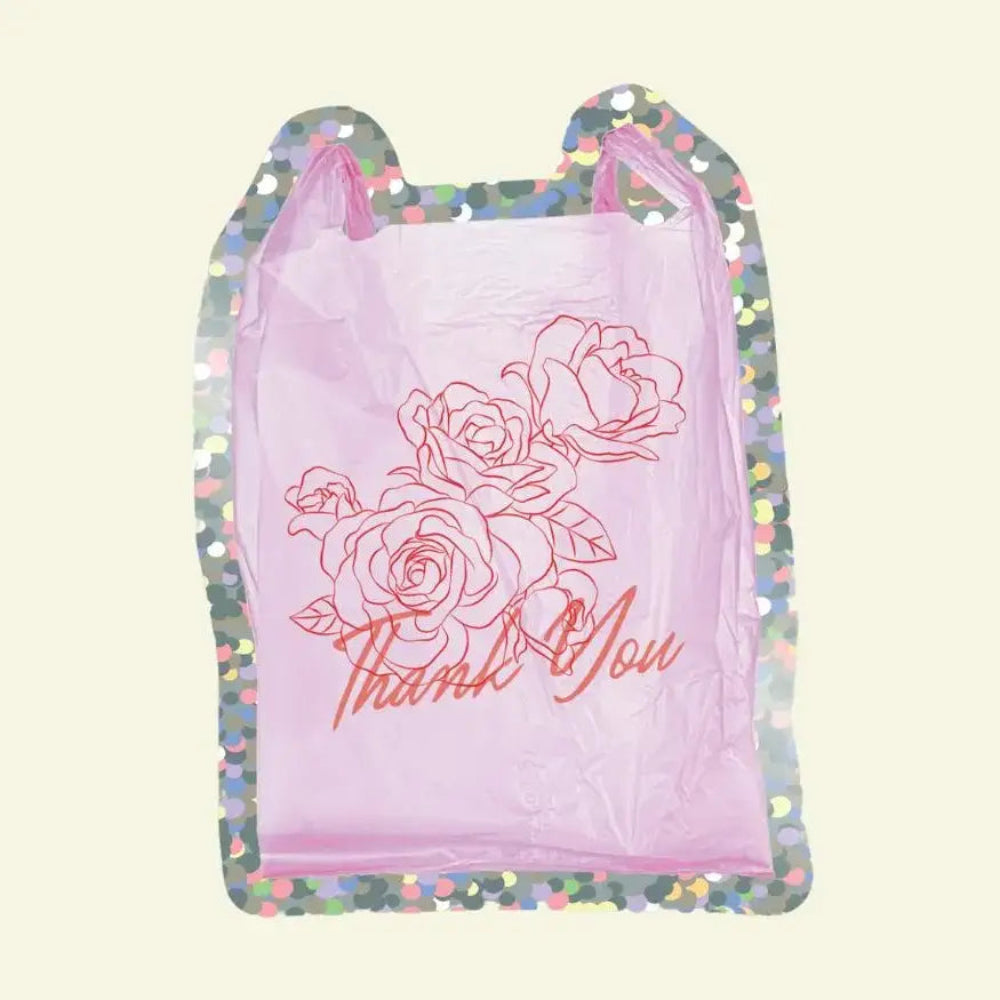Sticker of a pink plastic bag on a glitter background