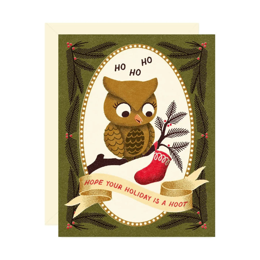 Christmas card with an owl and red stocking on a green background