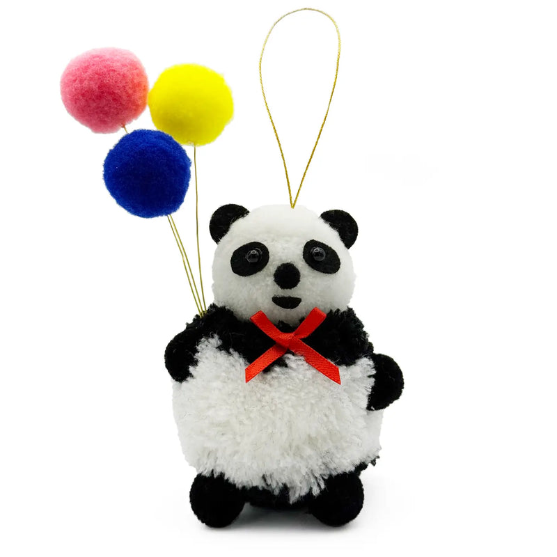 Panda wearing a red bow holding three balloons pom pom ornament on a white background.